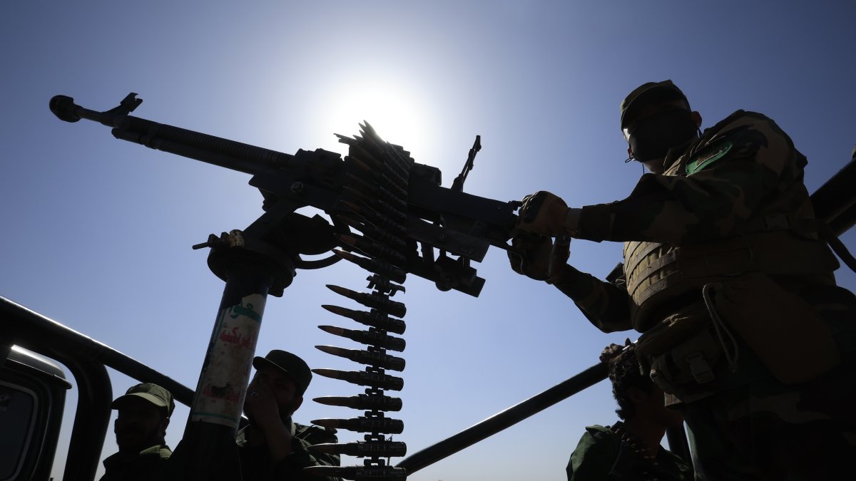 Houthi troopers patrol during a gathering to mobilize more fighters in Sana'a, Yemen, July 2, 2026. (EPA Photo)