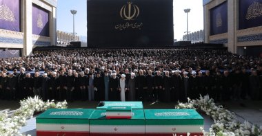 Iranian officials pray next to the coffins of Iran's slain supreme leader, Ayatollah Ali Khamenei, and his family members at the Grand Mosalla during the second day of his funeral ceremonies in Tehran, Iran, July 5, 2026. (AFP Photo)