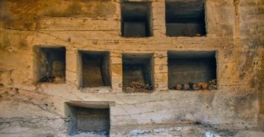 In this photo provided by the Ministry of Tourism and Antiquities, seven surface limestone-built tombs discovered in the Marina el-Alamein archaeological site are seen, west of the Mediterranean city of Alexandria, Egypt, July 4, 2026. (AP Photo)
