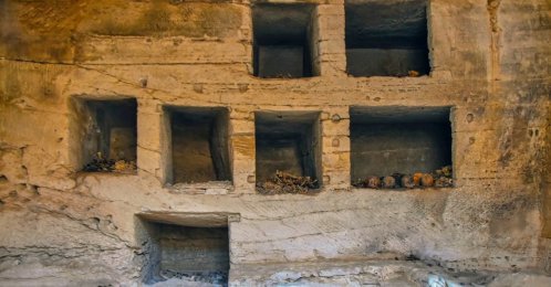 In this photo provided by the Ministry of Tourism and Antiquities, seven surface limestone-built tombs discovered in the Marina el-Alamein archaeological site are seen, west of the Mediterranean city of Alexandria, Egypt, July 4, 2026. (AP Photo)