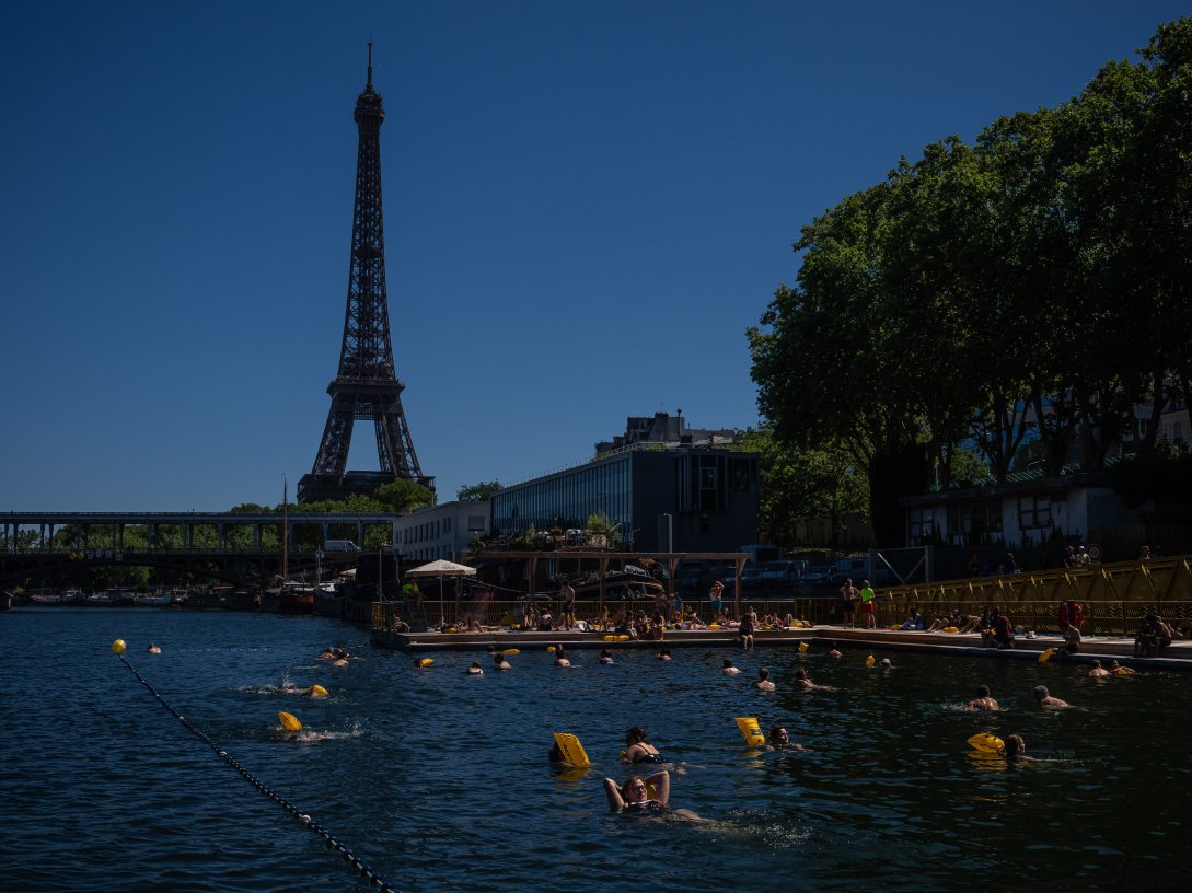 People swimming in the Seine River, Paris, France, July 4, 2026. (AP Photo)
