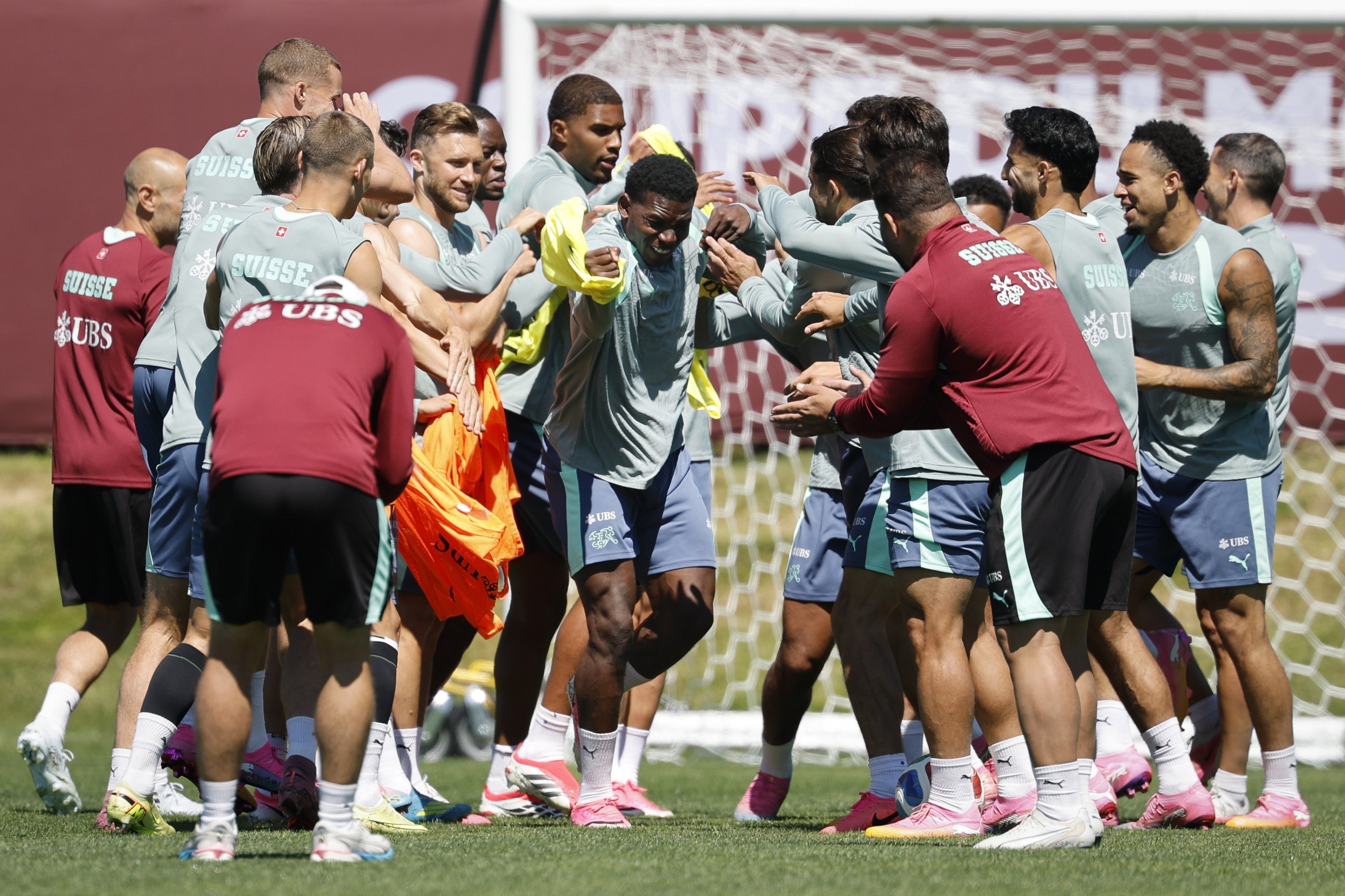 Switzerland's Breel Embolo (C) gets slapped by his teammates during a Switzerland training session at the National Soccer Development Center in Vancouver, Canada, July 5, 2026. (EPA Photo)
