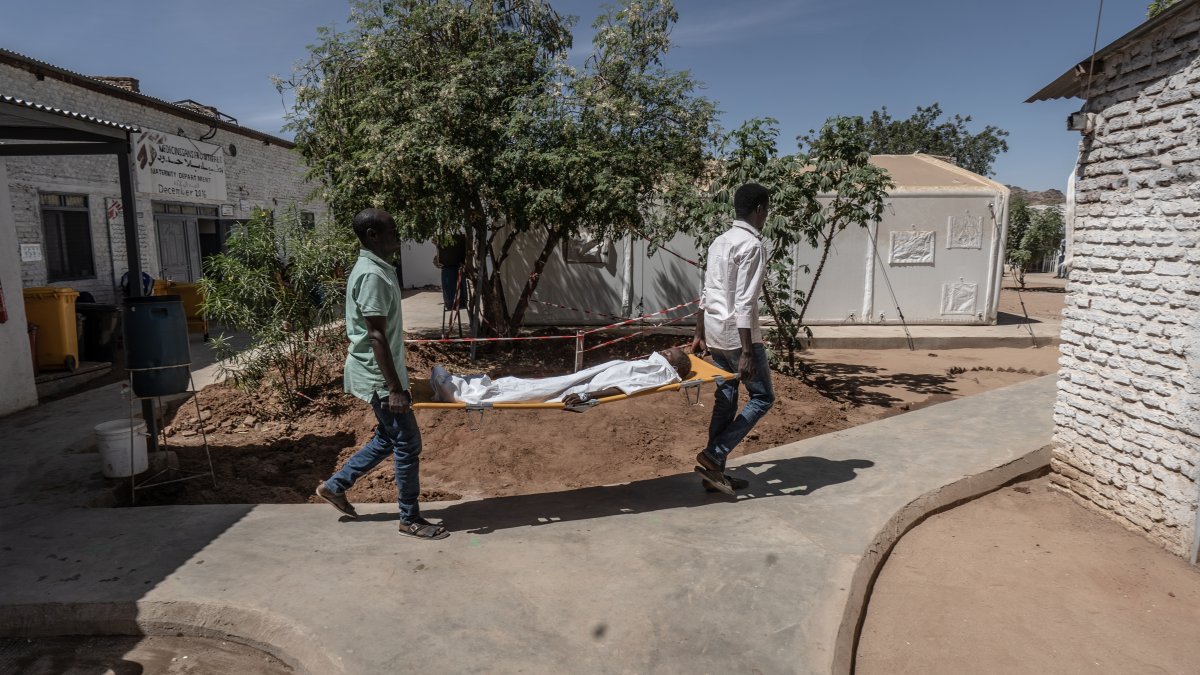 Medical workers carry an injured boy on a stretcher from the operating theatre to the intensive care unit at the MSF-run Paris Hospital in Tawila, north Darfur, Sudan, Feb. 28, 2026. (Getty Images Photo) 