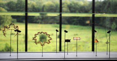 Jewelry created by French glass maker Rene Lalique is seen at the Lalique museum, Wingen-sur-Moder, eastern France, June 23, 2011. (AFP Photo)