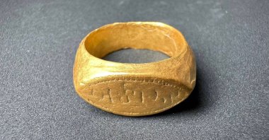 The Fine Arts Department shows a gold ring at the Don Yai Thong archeological site, Phetchaburi, Thailand, July 2, 2026. (AP Photo)