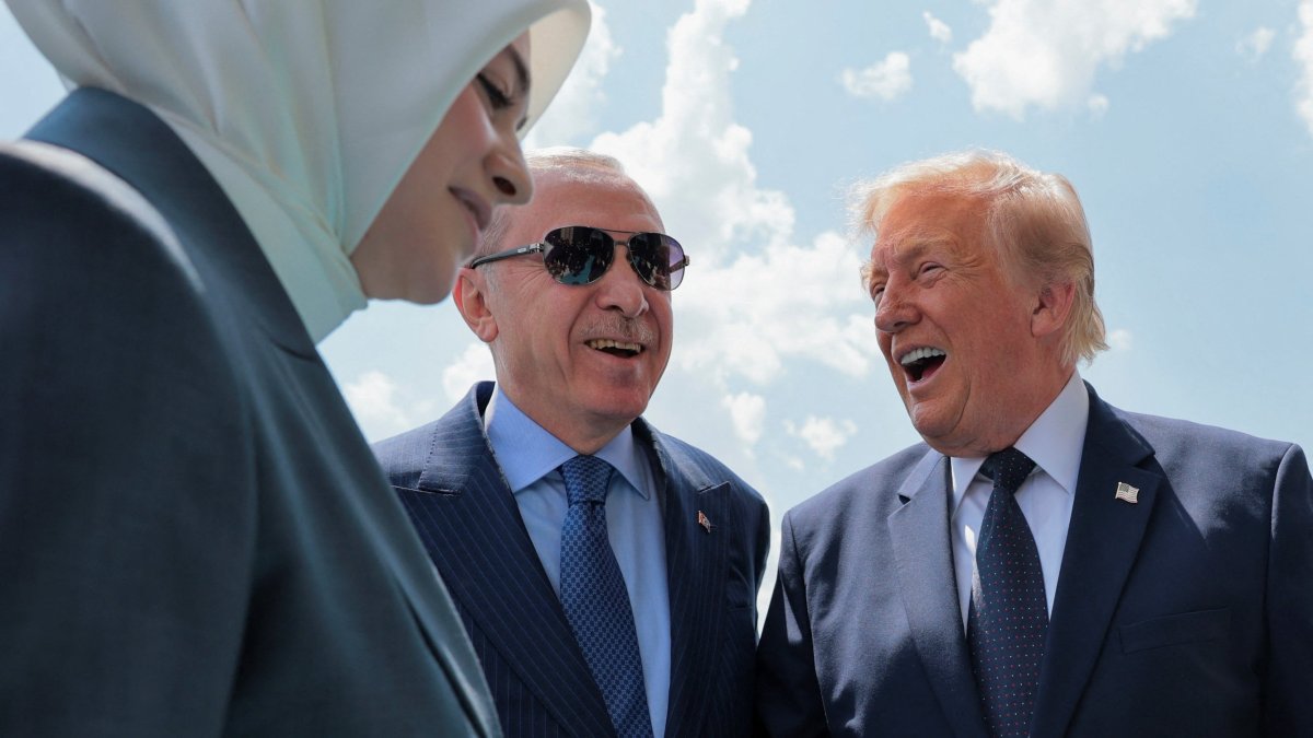 U.S. President Donald Trump is greeted by Turkish President Recep Tayyip Erdoğan as he arrives aboard Air Force One, in Ankara, Türkiye, July 7,2026. (Reuters Photo) 