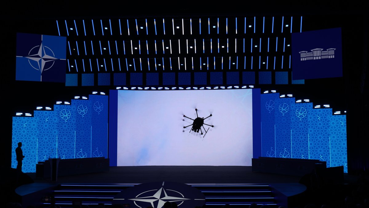 Participants watch a display on a screen at the NATO Defense Industry Summit Forum, Ankara, Türkiye, July 7, 2026 (EPA Photo)