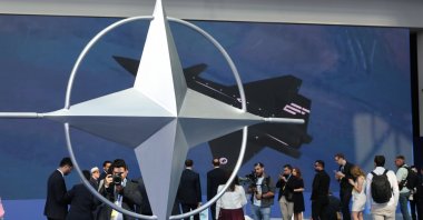 People wait at the venue of the NATO Defense Industry Summit Forum, Ankara, Türkiye, July 7, 2026. (EPA Photo)