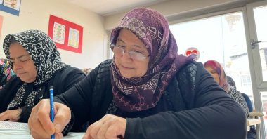 Esme Özgüler during her education course that helps her learn to read and write, Gaziantep, Türkiye, July 7, 2026. (DHA Photo) 