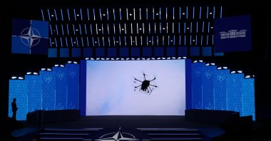 Participants watch a display on a screen at the NATO Defense Industry Summit Forum, Ankara, Türkiye, July 7, 2026 (EPA Photo)