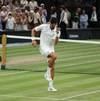 Serbia's Novak Djokovic celebrates after winning his quarter final match against Canada's Felix Auger-Aliassime, London, U.K., July 7, 2026. (Reuters Photo)