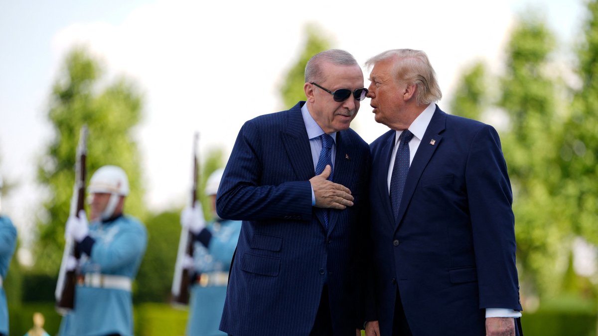U.S. President Donald Trump speaks with President Recep Tayyip Erdoğan during a formal arrival at the Presidential Complex at the NATO summit,  Ankara, Türkiye, July 7, 2026. (Reuters Photo)