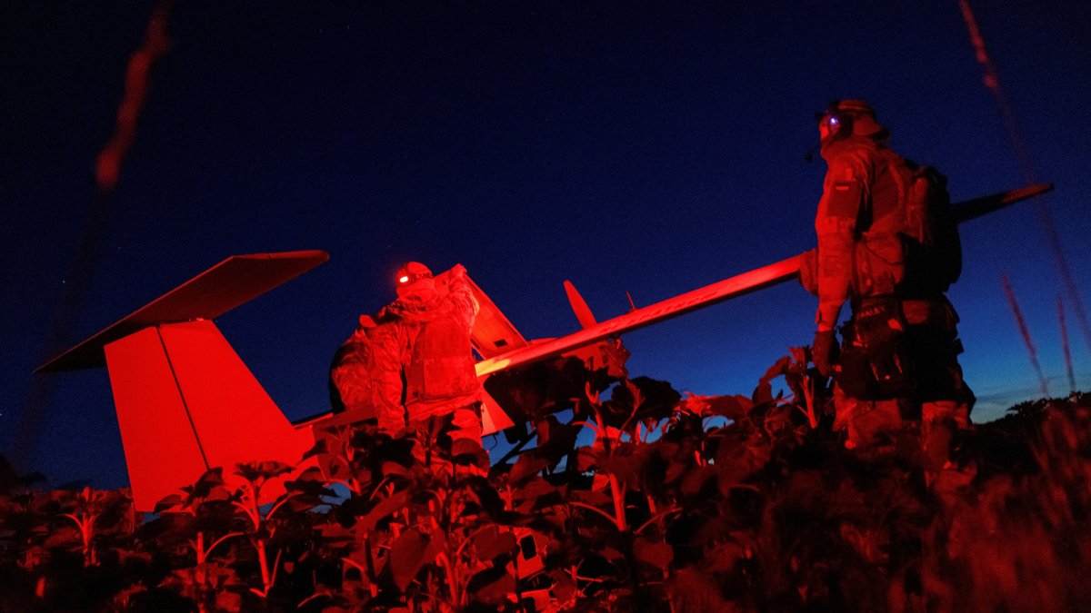 Service members of the Ukrainian Armed Forces prepare a Zozulia mid-strike drone for a flight while they work at a position near a front line, amid Russia's attack on Ukraine, in an undisclosed location in southern Ukraine, on an undisclosed date, 2026. (Reuters Photo)