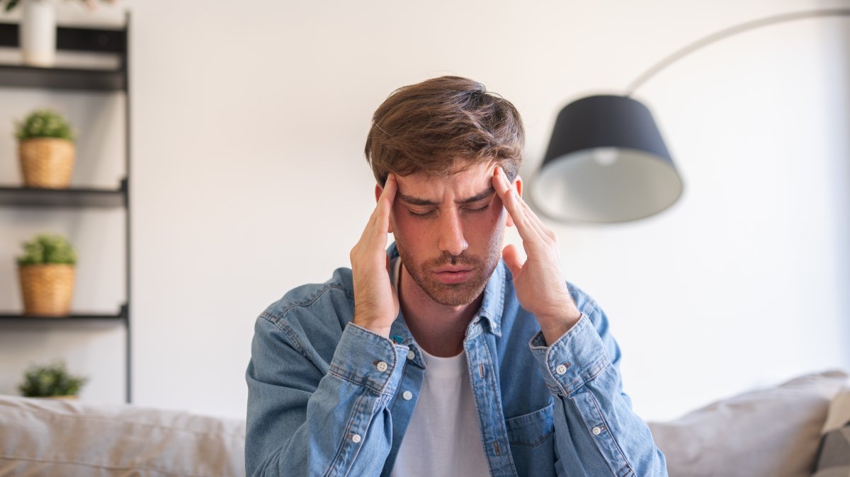 Symptoms such as headaches, fatigue, dizziness and difficulty concentrating may be linked to fluid loss and could indicate dehydration. (Shutterstock Photo)