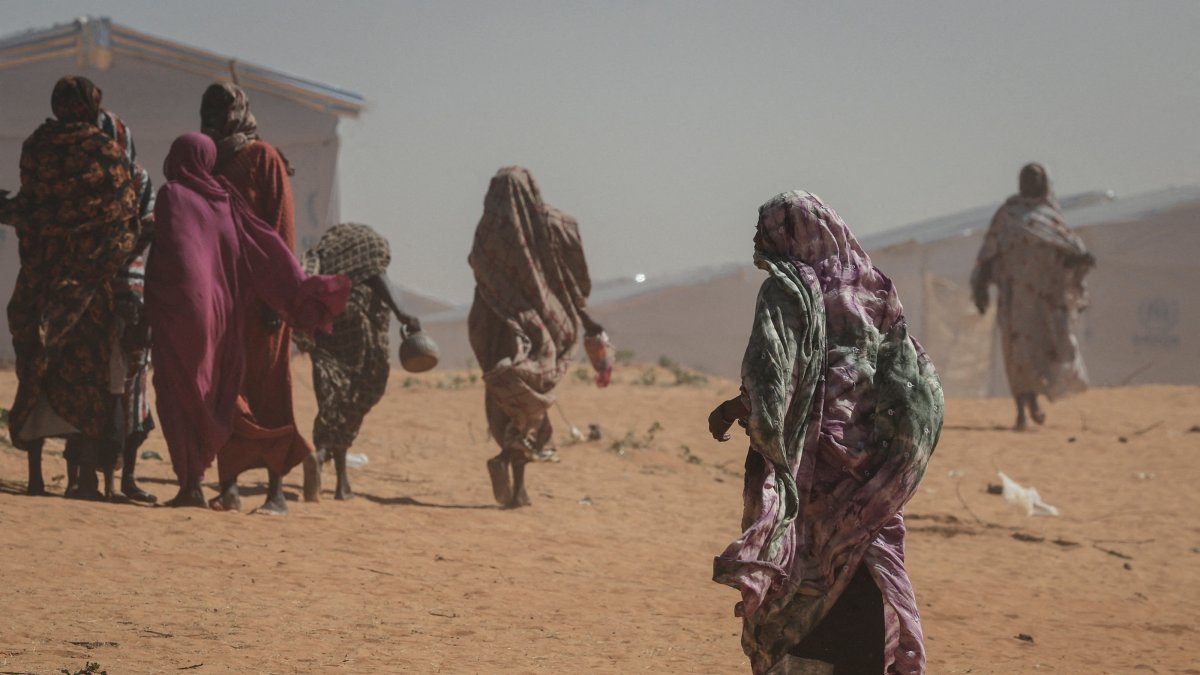 Sudanese refugee women walk at the Tulum refugee camp, amid ongoing conflict in Sudan between the paramilitary Rapid Support Forces (RSF) and the Sudanese army, in Wadi Fira province, eastern Chad, Nov. 30, 2025. (Reuters Photo)