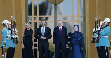 Greek Prime Minister Kyriakos Mitsotakis (2nd L) and his wife Mareva Grabowski (L) pose with President Recep Tayyip Erdoğan and first lady Emine Erdoğan, Ankara, Türkiye, July 7, 2026. (AFP Photo)