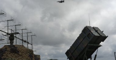 The Ukrainian Air Force's F-16 fighter jets fly over a Patriot Air and Missile Defense System in an undisclosed location in Ukraine, Aug. 4, 2024. (AP Photo)