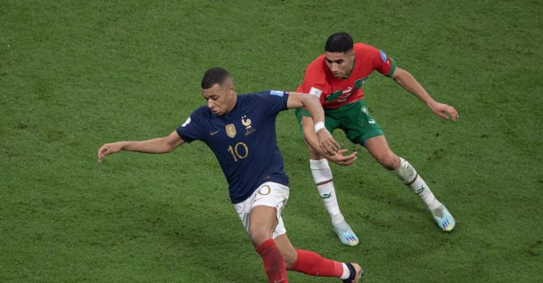 France's Kylian Mbappe (L) and Morocco's Achraf Hakimi in action during the 2022 FIFA World Cup semifinal match at Al Bayt Stadium, Al Khor, Qatar, Dec. 14, 2022. (Getty Images Photo)
