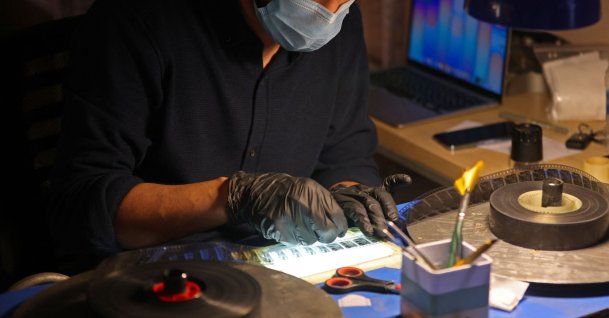 Director Ahmed al-Samar restores a film reel at the National Center for Archives and Iraqi Memory, Baghdad, Iraq, June 14, 2026. (AFP Photo)