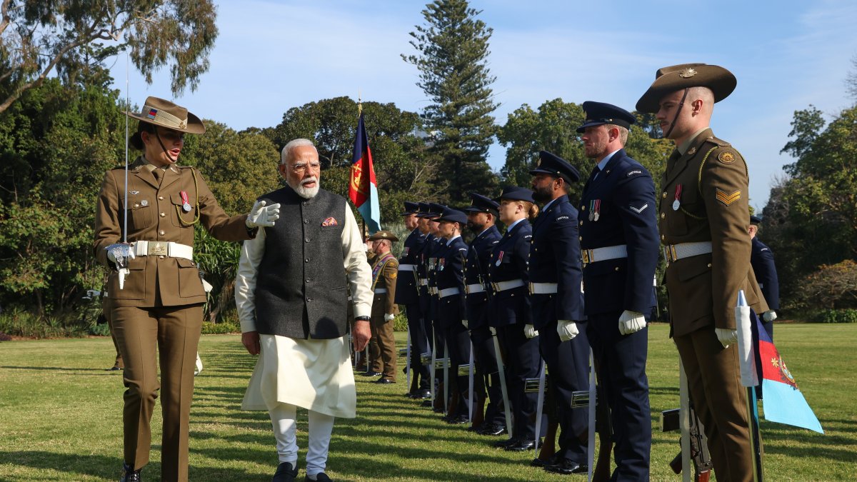 Indian Prime Minister Narendra Modi inspects a guard of honor during a ceremonial welcome at Government House, Melbourne, Australia, July 9, 2026. (AP Photo)