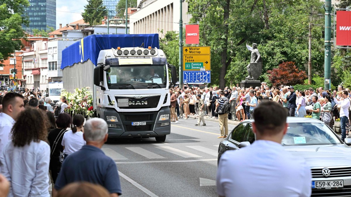 Residents pay their respects near the truck carrying the remains of the victims of the 1995 Srebrenica genocide, two days before its 31st anniversary, Sarajevo, Bosnia-Herzegovina, July 9, 2026. (AFP Photo)