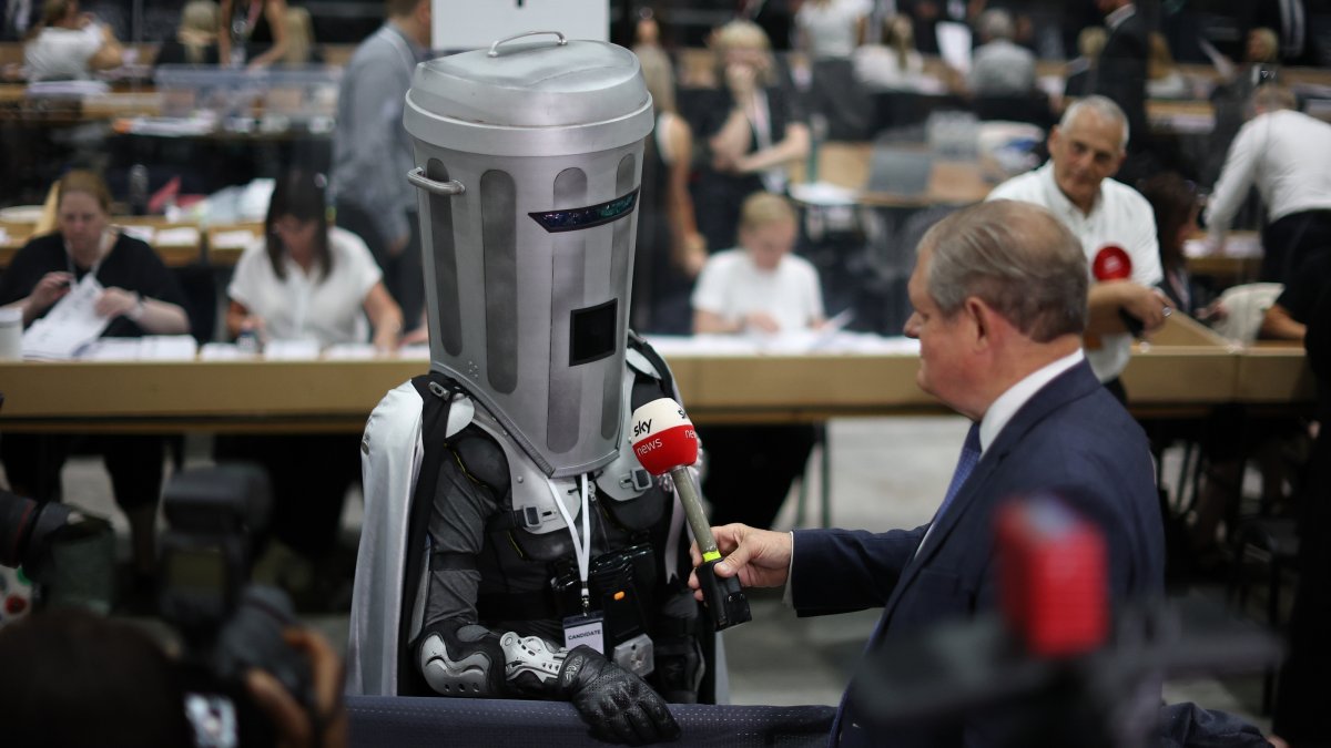 Count Binface speaks to members of the media during the vote count for the Makerfield by-election in Wigan, U.K., June 19, 2026. (EPA Photo)