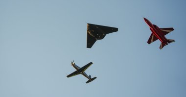 During the Defense Industry Forum 2026, held on the sidelines of the NATO summit, the Turkish defense industry’s aerial assets Anka-III, Hürjet and Hürkuş performed a formation flight at Turkish Aerospace Industries (TAI) Kahramankazan campus, Ankara, Türkiye, July 7, 2026. (AA Photo)