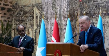 Somali President Hassan Sheikh Mohamud (L) listens as President Recep Tayyip Erdoğan speaks during a joint news conference, Istanbul, Türkiye, Dec. 30, 2025. (AP Photo)