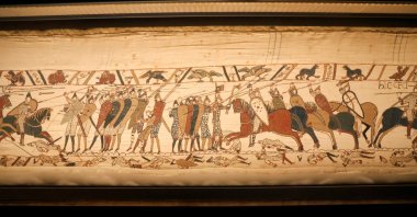 The Bayeux Museum showcases the Bayeux Tapestry, which portrays scenes from the 1066 Battle of Hastings, during its final days on view before the museum closes for renovations and transfers the historic embroidery to the British Museum, Bayeux, France, Aug. 29, 2025. (Reuters Photo)