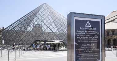 A sign announces the closure of the Louvre Museum in the afternoon on one of the hottest days on record, Paris, France, June 24, 2026. (EPA Photo)