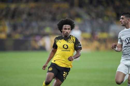 Dortmund's Karim Adeyemi runs during the German Bundesliga match against VfL Wolfsburg, Dortmund, Germany, Sept. 21, 2025. (AP Photo)