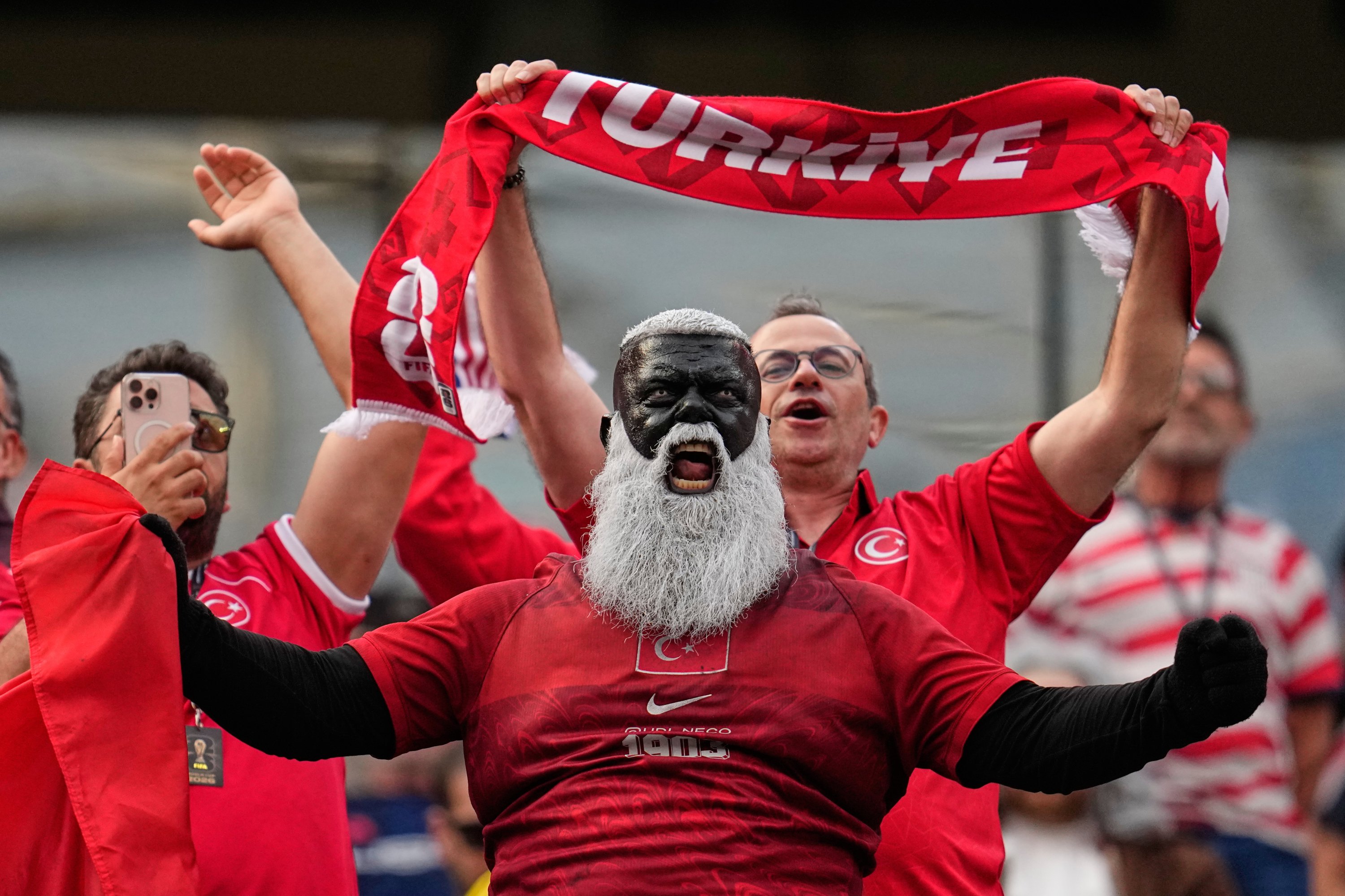 World Cup fans turn stadiums into global carnival of color, passion