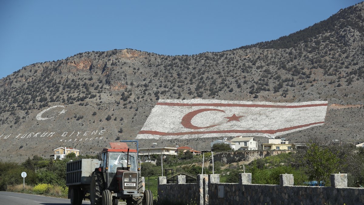 A massive Turkish Republic of North Cyprus (TRNC) flag adorns a mountainside, Taşkent, TRNC, March 6, 2017. (Getty Images Photo)