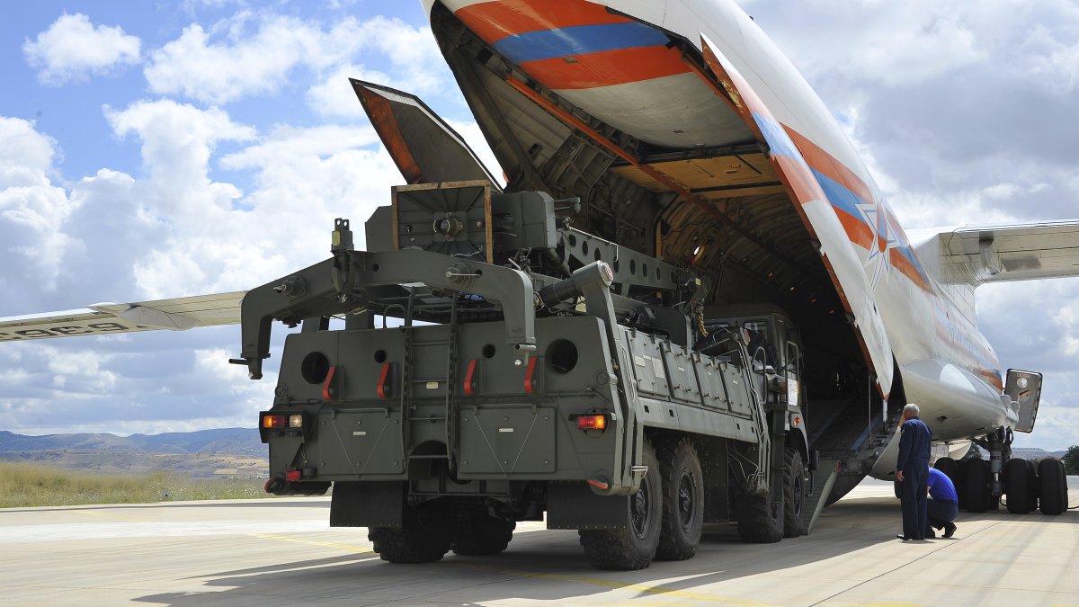 Military vehicles and equipment, parts of the S-400 air defense systems, are unloaded from a Russian transport aircraft at a military airport, Ankara, Türkiye, July 12, 2019. (AP Photo)