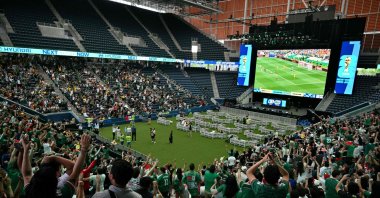 Fans celebrate Mexico's first goal in the opening match of the 2026 World Cup football tournament during a watch party at the "Queens Group Stage HQ" at USTA Billie Jean King National Tennis Center, New York, U.S., June 11, 2026. (AFP Photo)