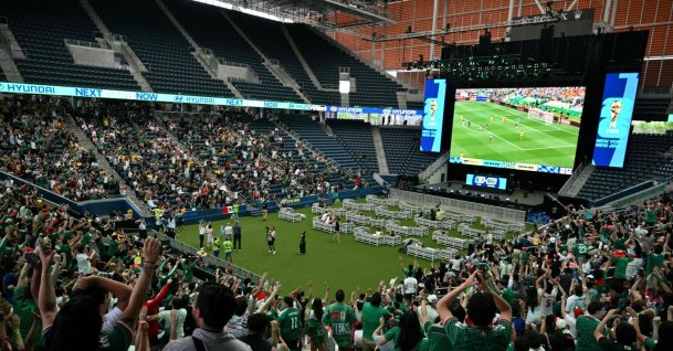 Fans celebrate Mexico's first goal in the opening match of the 2026 World Cup football tournament during a watch party at the "Queens Group Stage HQ" at USTA Billie Jean King National Tennis Center, New York, U.S., June 11, 2026. (AFP Photo)