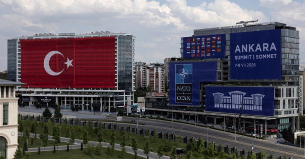 A Turkish national flag and NATO summit banners on buildings a day before the start of the NATO summit, Ankara, Türkiye, July 6, 2026. (Reuters Photo)
