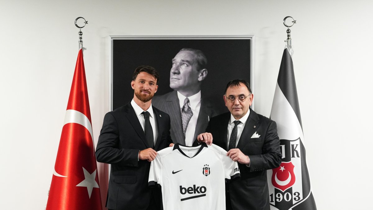 Salih Özcan (L) poses for a photo after signing for Beşiktaş, Istanbul, Türkiye, July 9, 2026. (IHA Photo)