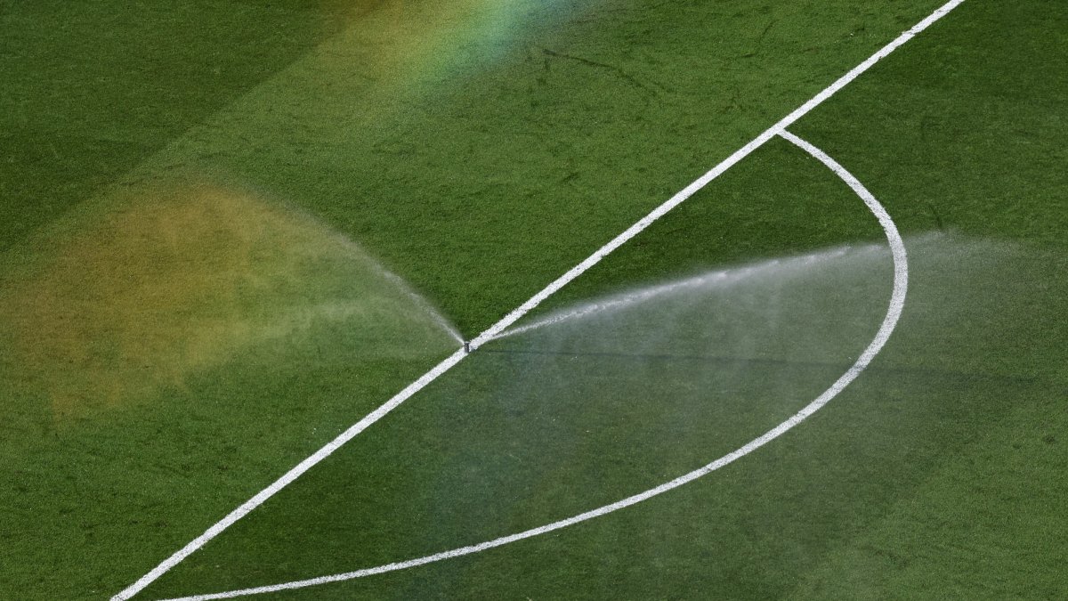 Prinklers water the pitch during half-time in the FIFA World Cup 2026 quarterfinals match between France and Morocco, Boston, U.S, July 9, 2026. (EPA Photo)