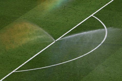 Prinklers water the pitch during half-time in the FIFA World Cup 2026 quarterfinals match between France and Morocco, Boston, U.S, July 9, 2026. (EPA Photo)