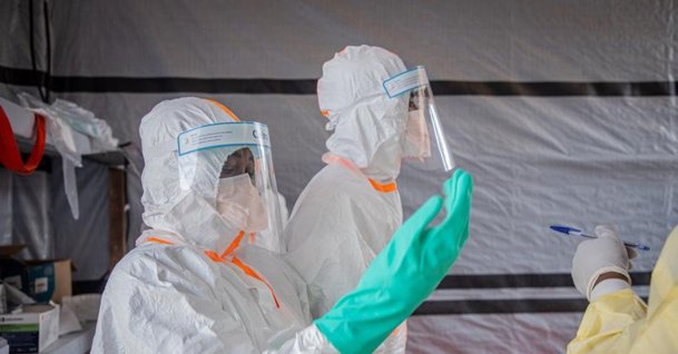 Medical workers put on protective suits at an Ebola treatment center in Bunia, the capital of Ituri Province in the Democratic Republic of the Congo, July 6, 2026. (Reuters Photo)