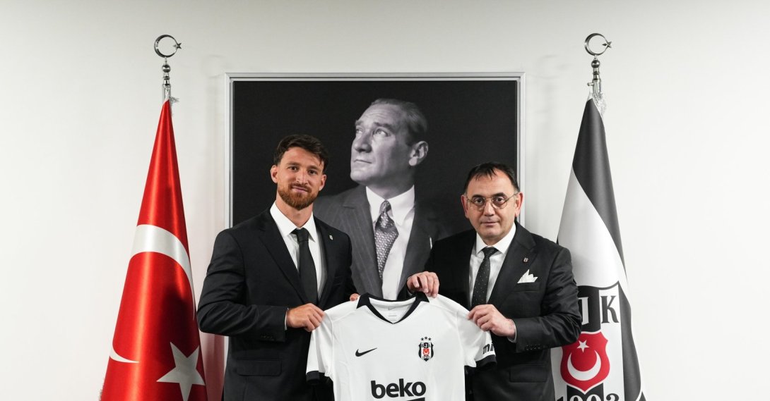 Salih Özcan (L) poses for a photo after signing for Beşiktaş, Istanbul, Türkiye, July 9, 2026. (IHA Photo)