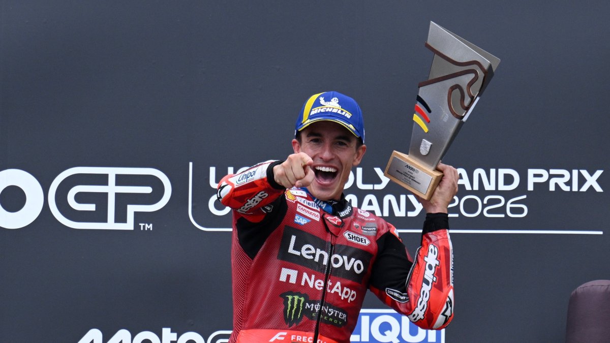 Ducati Lenovo Team's Marc Marquez celebrates on the podium after winning the German MotoGP race, Sachsenring, Germany, July 12, 2026. (Reuters Photo)