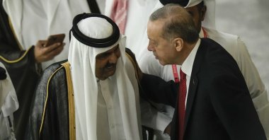 Former Emir of Qatar Sheikh Hamad bin Khalifa Al Thani (L) and President Recep Tayyip Erdoğan greet each other before the start of the World Cup, Al Khor, Qatar, Nov. 20, 2022. (AP Photo)