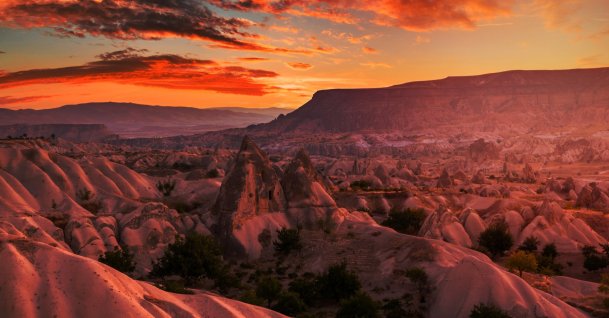 The rocky landscape of Cappadocia at sunset, Türkiye. (Shutterstock Photo)