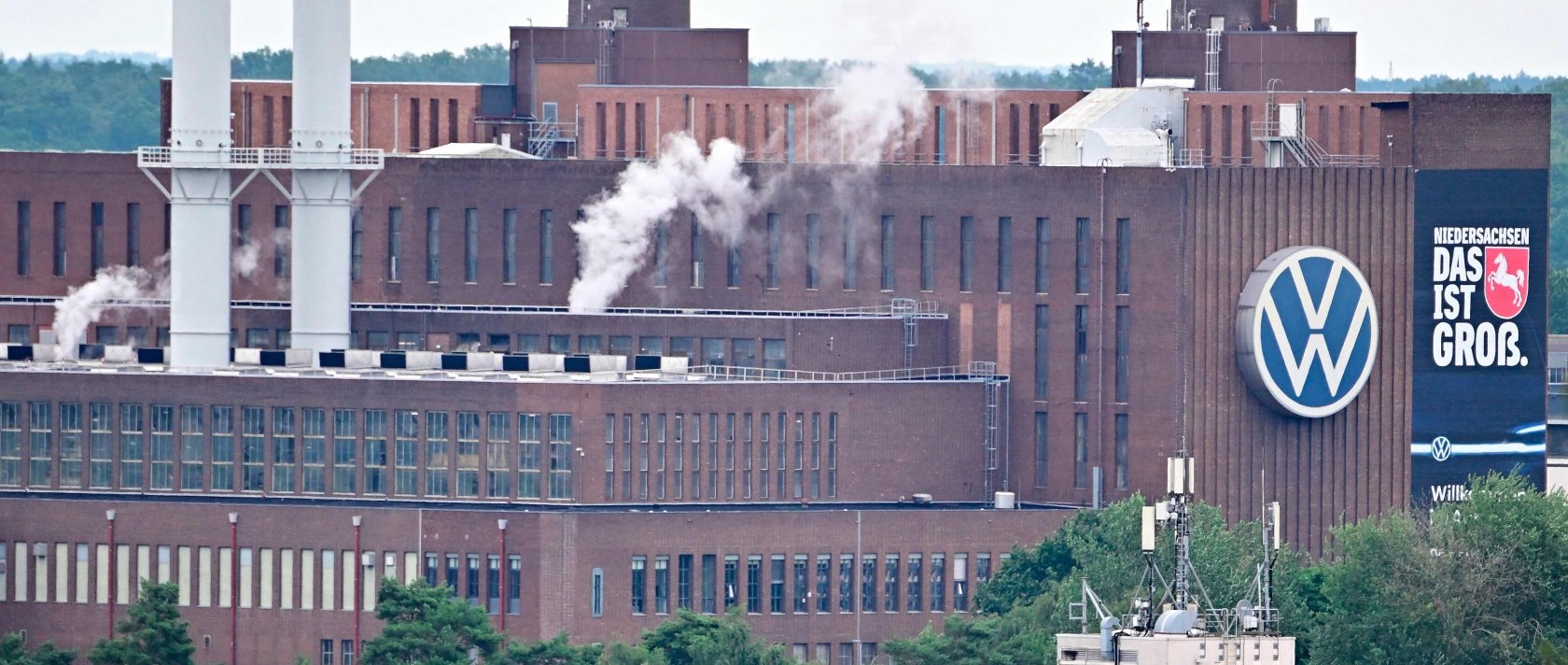 A general view shows chimneys and buildings at the Wolfsburg Volkswagen (VW) Plant, Wolfsburg, Germany, July 9, 2026. (AFP Photo)