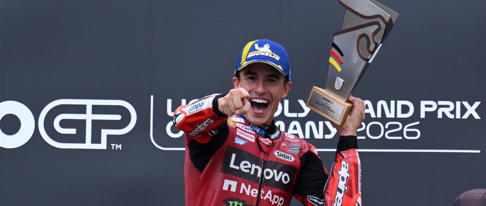 Ducati Lenovo Team's Marc Marquez celebrates on the podium after winning the German MotoGP race, Sachsenring, Germany, July 12, 2026. (Reuters Photo)