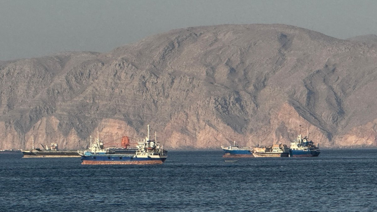 Vessels are seen anchored in the Strait of Hormuz, off Khasab, northern Musandam Peninsula, Oman, May 17, 2026. (AFP Photo)