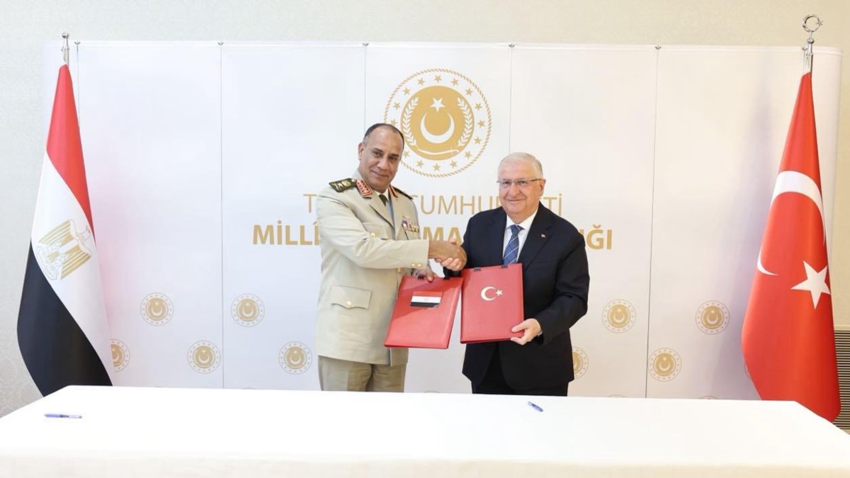 National Defense Minister Yaşar Güler (R) shakes hands with his Egyptian counterpart Ashraf Salem Zaher after signing the memorandum, Ankara, Türkiye, July 13, 2026. (DHA Photo)