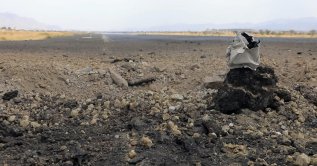 A handout screen grab taken from a video released on July 13, 2026, and made available by the Houthis-run al-Masirah TV shows damage at the runway of Sanaa airport following airstrikes, in Sanaa, Yemen, July 13, 2026. (EPA Photo)